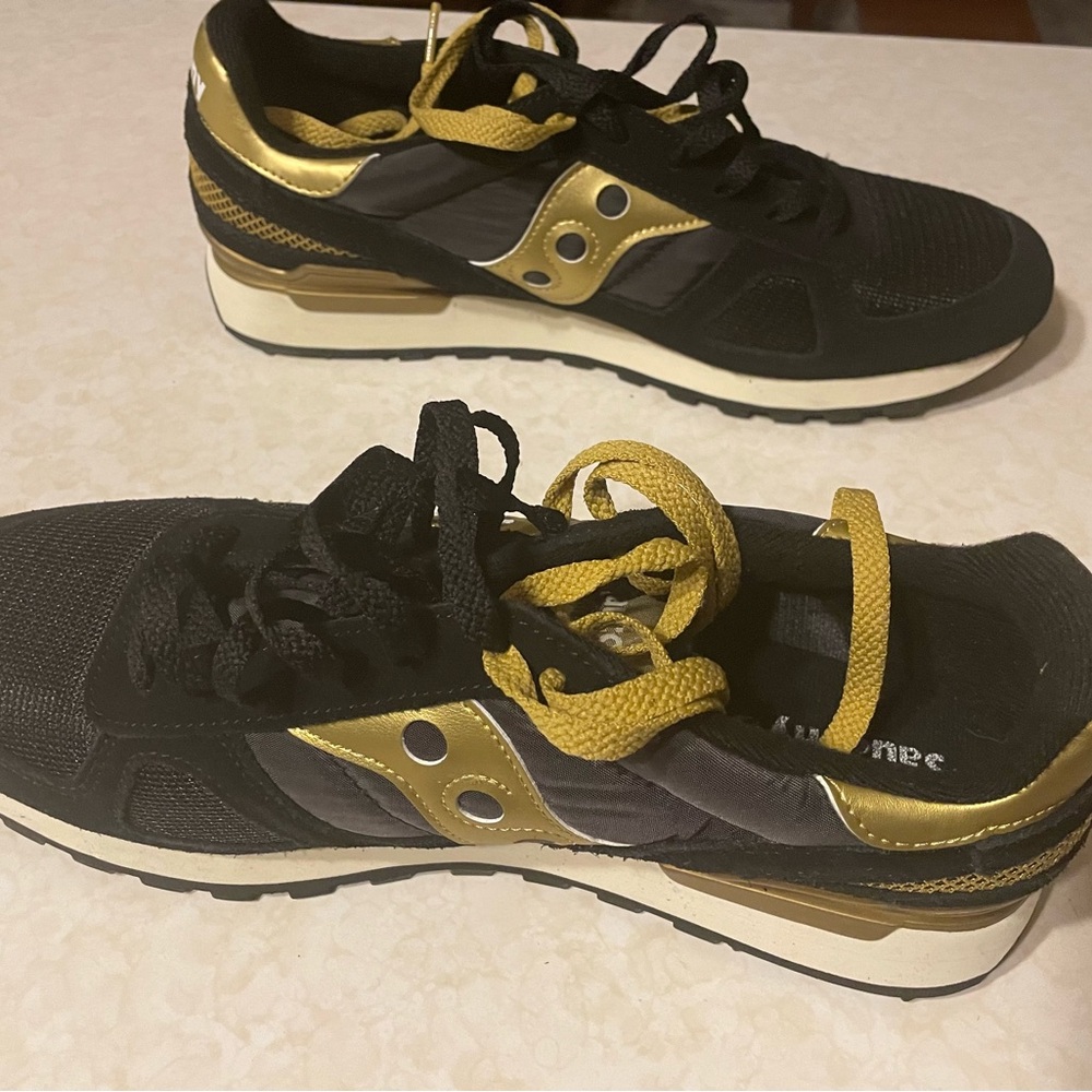 Saucony Black and Gold Athletic Shoes